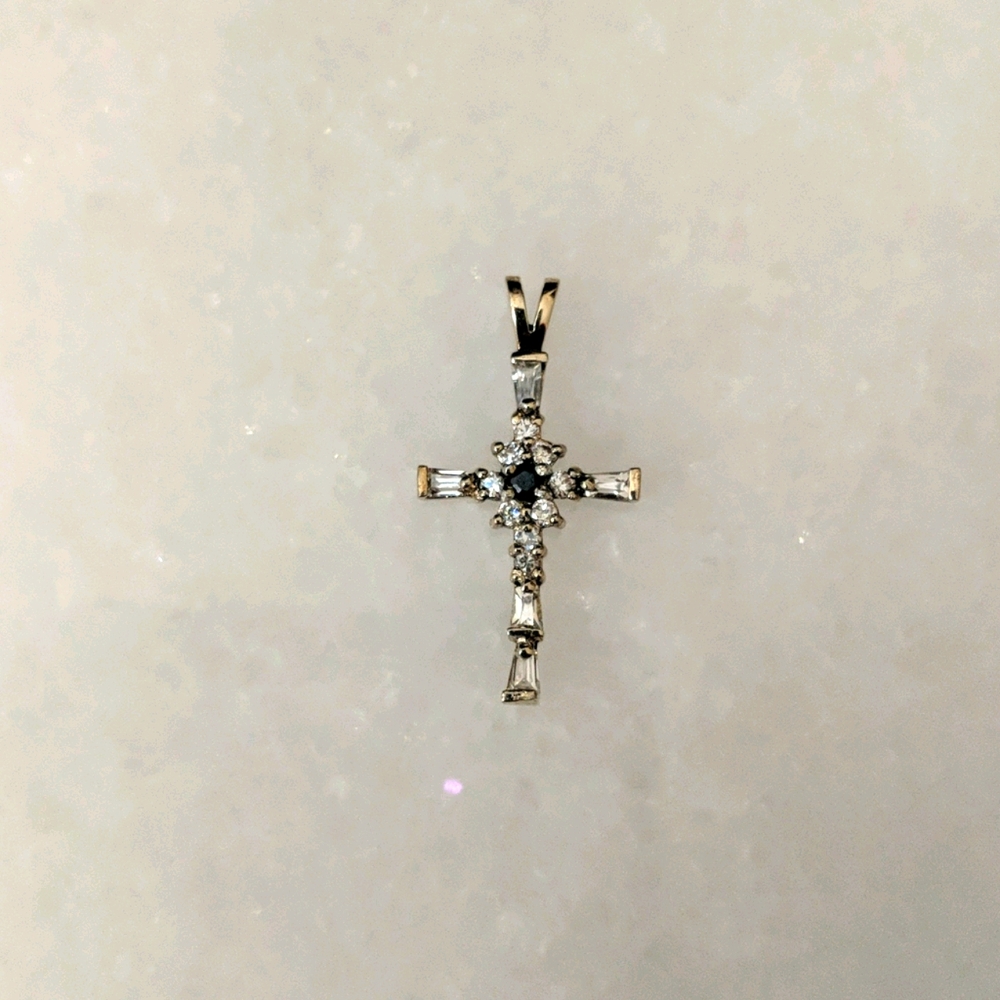 Diamond, Sapphire and gold cross pendant.